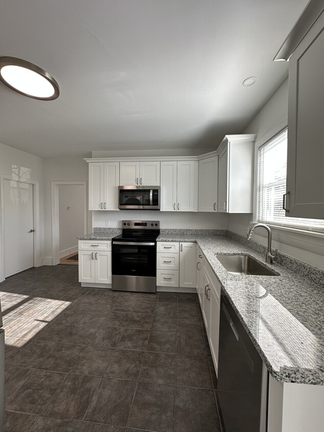 Fully renovated kitchen with brand, new microwave, stove, dishwasher, Refrigerator, washer and dryer - 12 Tiffany St