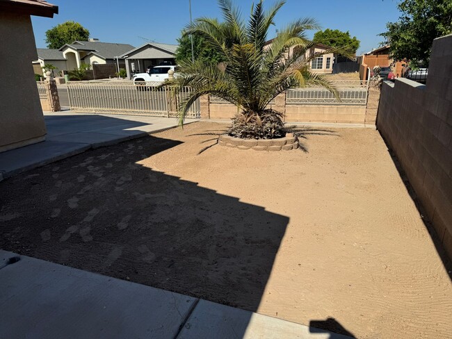 Building Photo - Enjoy this Fully Fenced San Luis Home