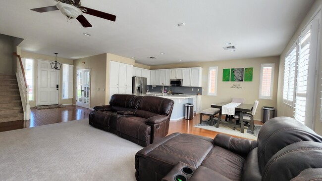 Living room, kitchen and dining - 743 W Bel Esprit Cir