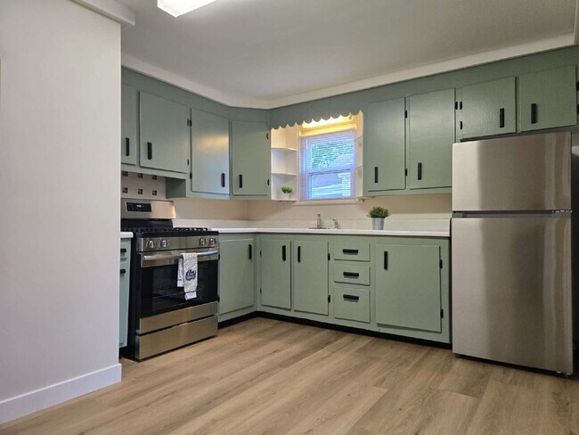 Building Photo - Room to Roam — Updated 2 Bed with Huge Yard & 2-Car Garage