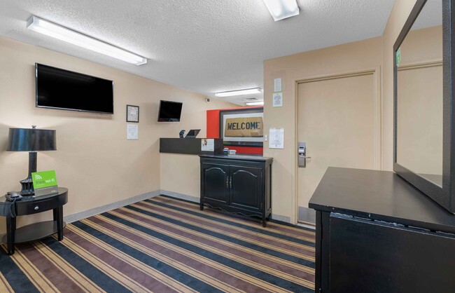 Lobby and Guest Check-in - Furnished Studio - Springdale