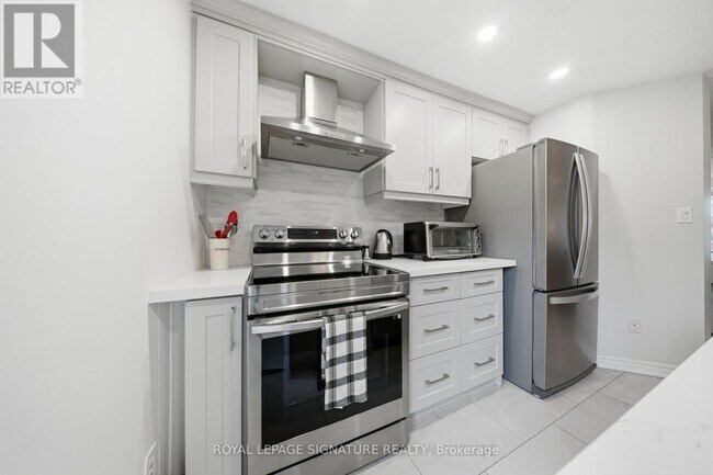 Photo du bâtiment - 209 Hunter St E