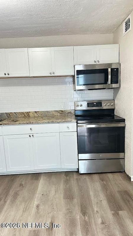 Foto del edificio - 1124 W 25th St