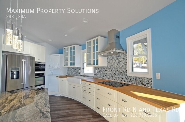 Building Photo - ALL INCLUSIVE! Stunning Waterfront Home