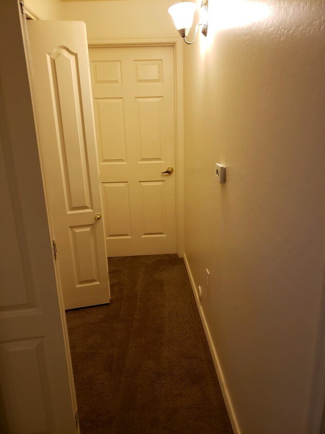 Hall between both rooms - 751 E Pine Knoll Dr
