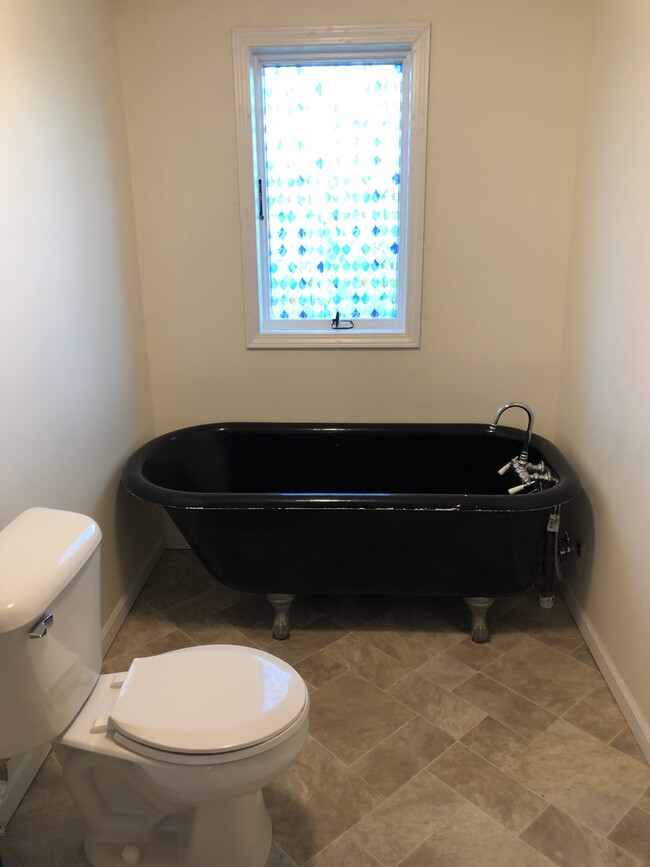 Original soaking tub - 115 117 Center Point Rd
