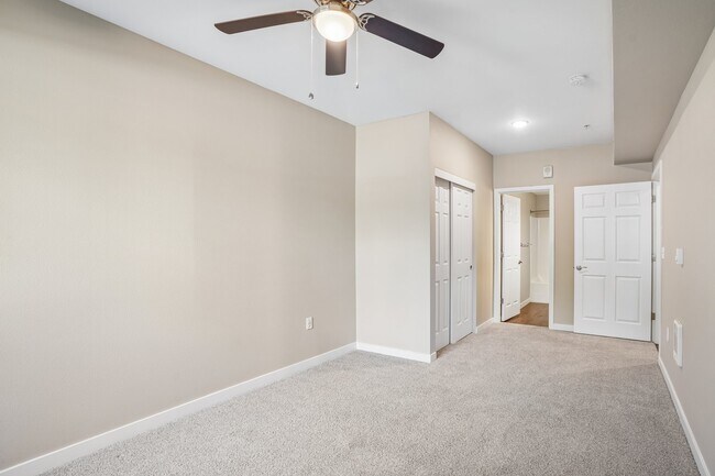 The River Primary Bedroom - Stevens Creek Apartments