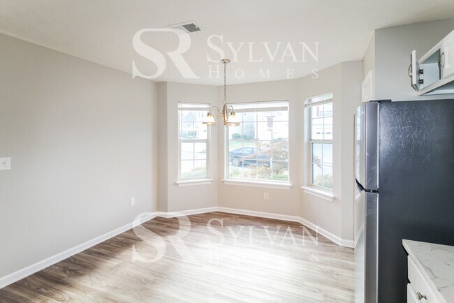 Building Photo - This lovely home awaits you