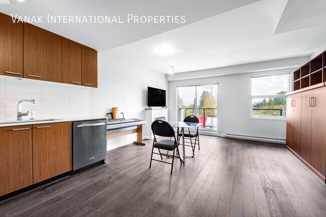 Building Photo - Modern Studio with Balcony, View & Parking...