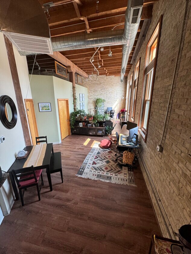 Cream city brick, exposed beams, 18’ ceilings - 306 E Lincoln Ave