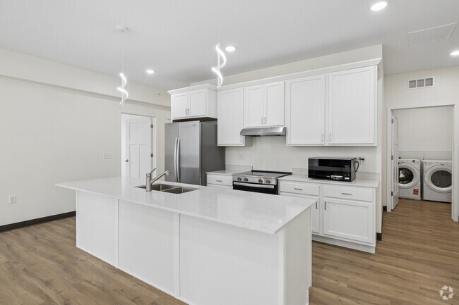 2 habitaciones, 2 baños - 1400 pies cuadrados - Cocina - Manor Heights Townhomes