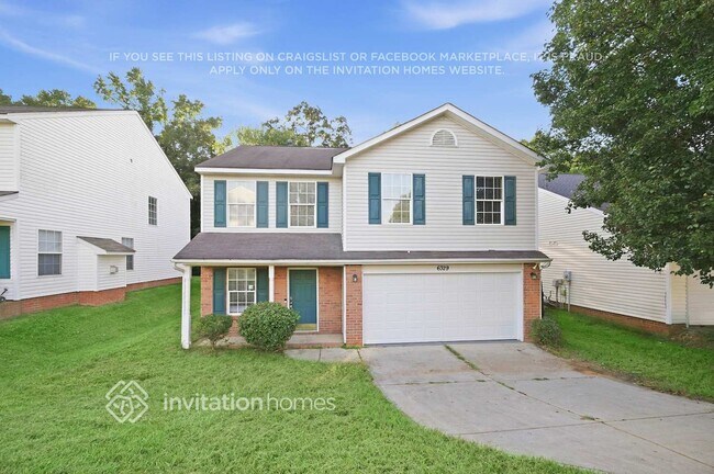 Building Photo - 6329 Day Lilly Ln