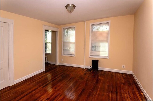 Building Photo - 261-10 86th Ave