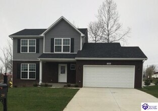 Building Photo - 208 Huckaberry St