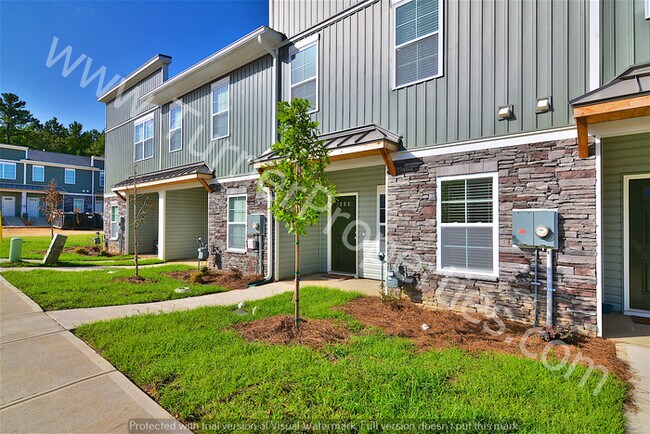 Building Photo - Awesome 2 BR Townhome w/ Granite Throughout