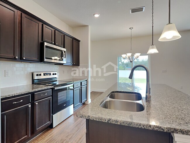 Foto del edificio - 6609 Hidden Rose Pl