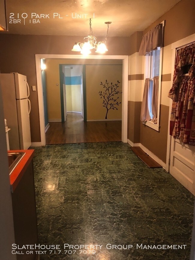 Building Photo - First floor two bedroom with fenced in yard