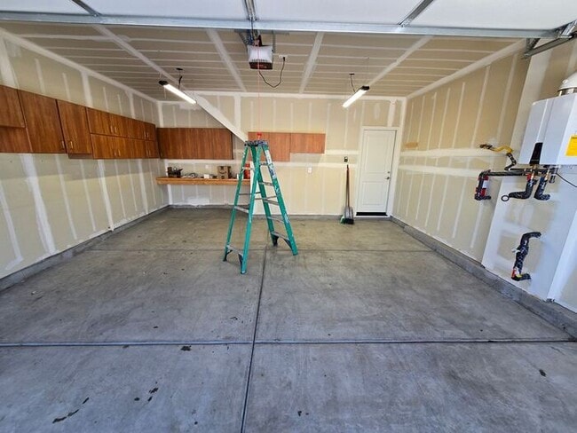 Building Photo - Modern 3-Bedroom Townhome with 2-Car Garage, Bright Interiors & Private Patio