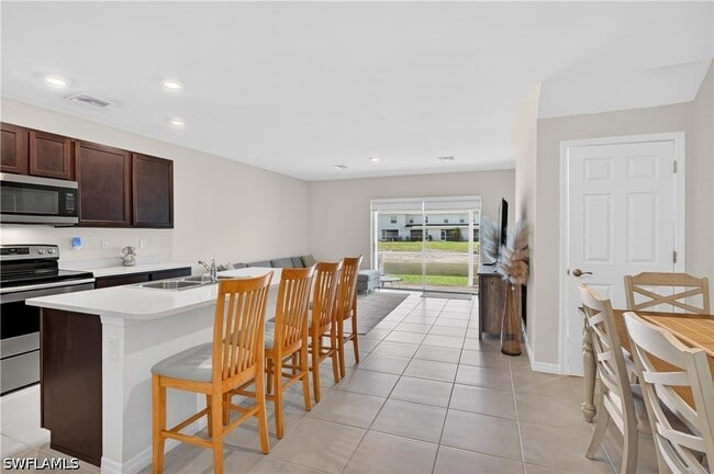 Foto del edificio - 15396 Wildflower Cir