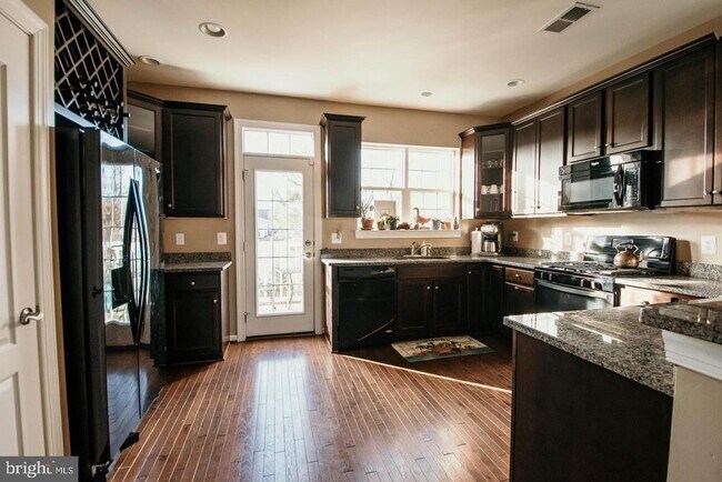 Foto del edificio - 7454 Riding Meadow Way