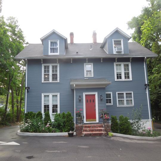 Rear of building with parking lot - 168 Main St