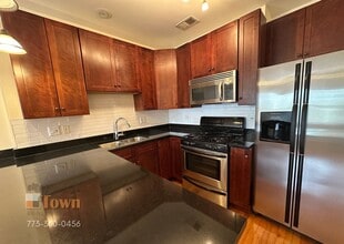 Building Photo - 6309 N Albany Ave