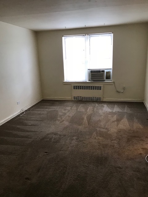 Empty Apartment facing front of buiding - 105-25 67th Ave