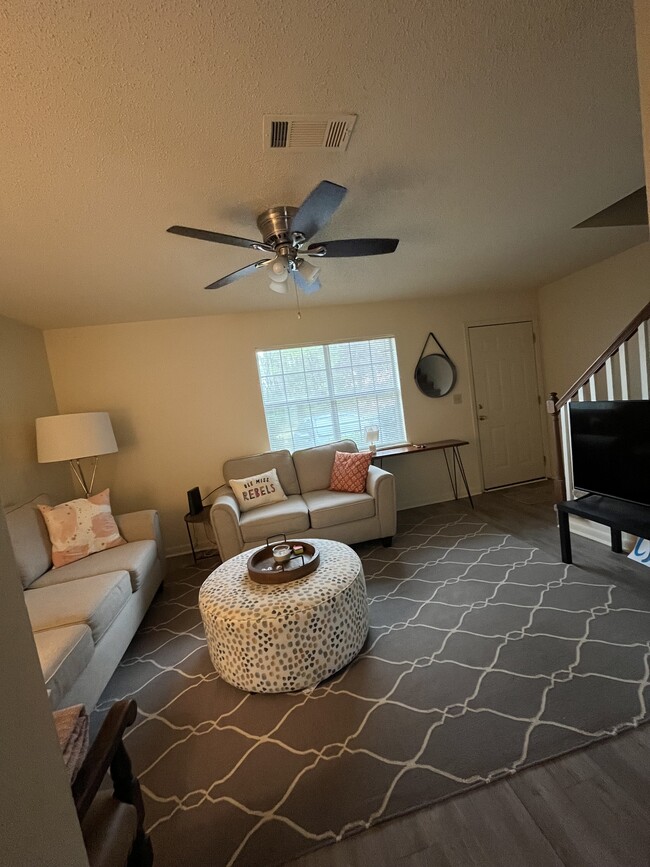 Den, coat closet, ceiling fan, & furniture included - 117 Michael Dr Apartments