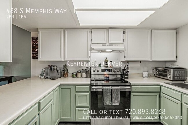 Building Photo - Charming 2 Bed 1 Bath Townhome with Deck a...