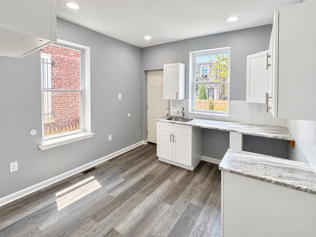 Foto del edificio - 6418 N Woodstock St