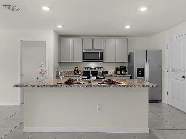 Building Photo - 8661 Triumph Cir