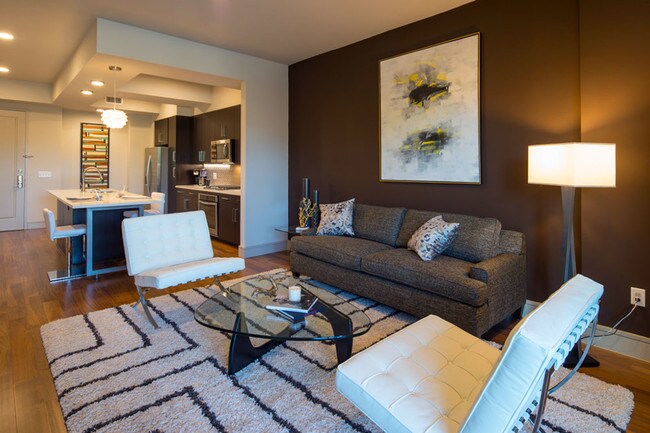 Building Photo - Two Bedrooms, One Extravagant Apartment