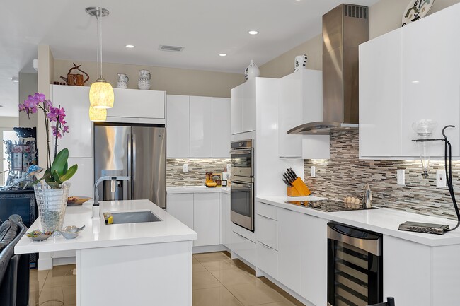 Kitchen with top of line appliances - 6309 NW 104th Path