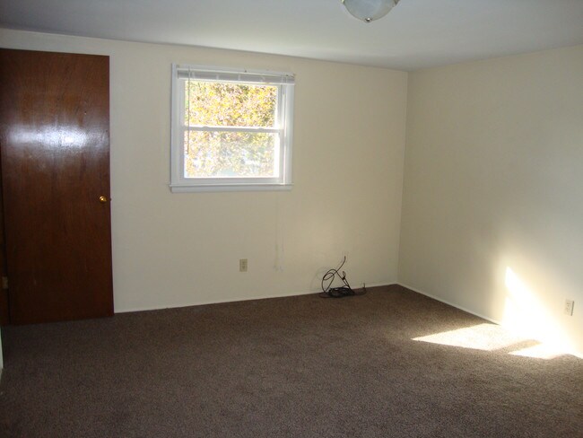 Master bedroom. Walk-in closet on left. - 708 Charlotte Ave