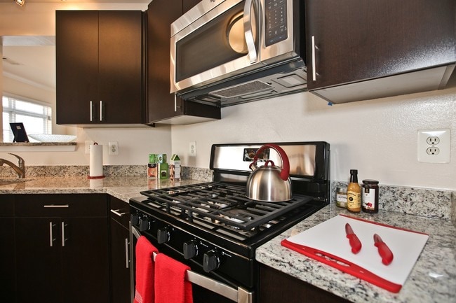 Renovated Kitchen in the Hawthorne apartment at Woodland Park - Woodland Park Apartments
