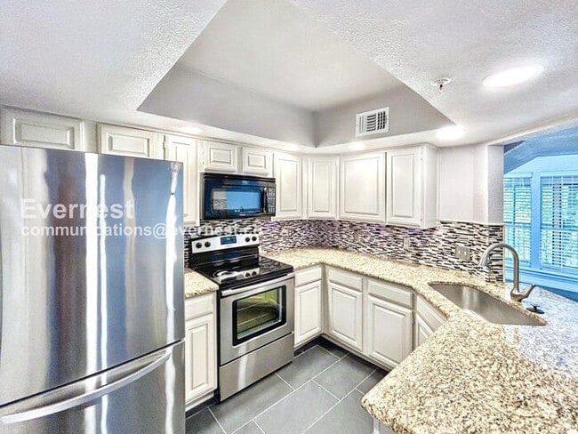 Foto del edificio - 5565 Preston Oaks Rd