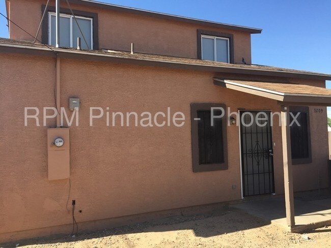 Building Photo - 1209 S 14th Ave