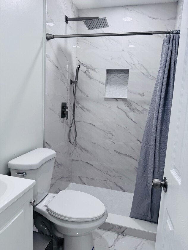 Brand new sink, toilet and shower - 1536 NW 45th St