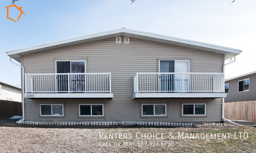 Primary Photo - North Lethbridge Townhouse with Laundry, P...