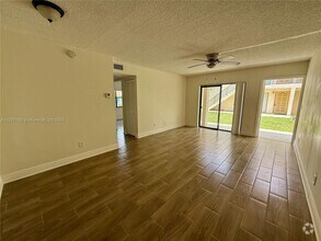 Building Photo - 11130 Royal Palm Blvd