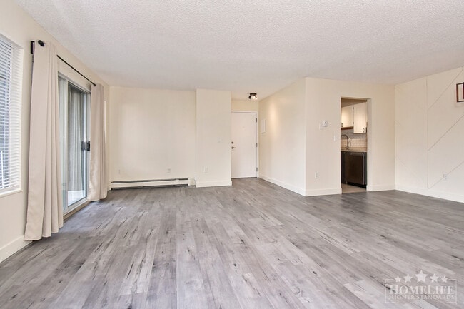 Building Photo - Modern 1-Bedroom Condo at Latimer Village....