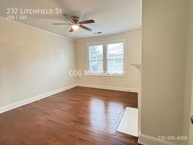 Building Photo - Completely Refurbished 2 bedroom/1Bath Cot...