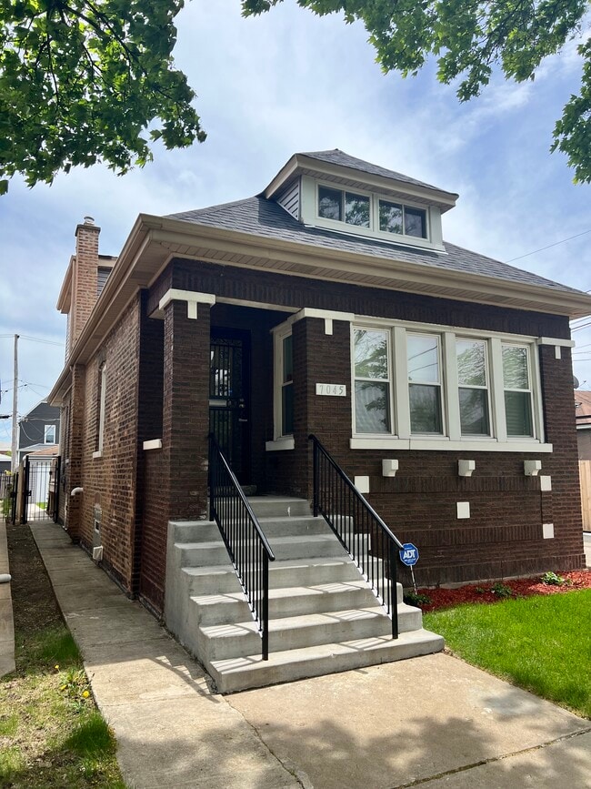 Foto del edificio - 7045 S Oakley Ave