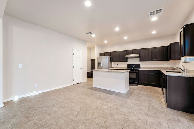 Building Photo - Stylish Two-Story Retreat with Designer Kitchen, Private Backyard & Flexible Living Space!