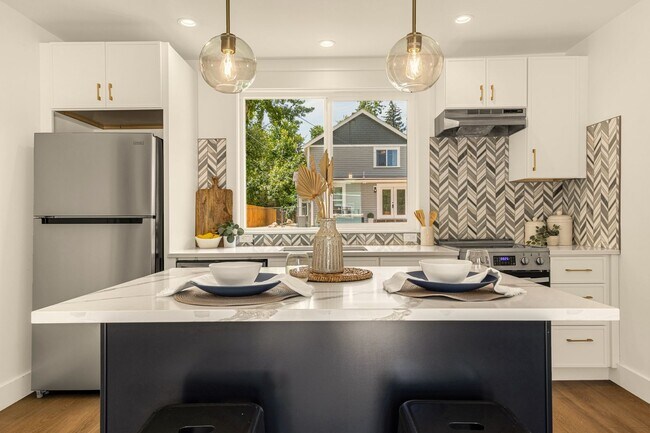 Foto del edificio - Stylish Ivy Wild 1-Bedroom with Heated Floors & Private Garage