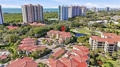 Building Photo - 7048 Pelican Bay Blvd