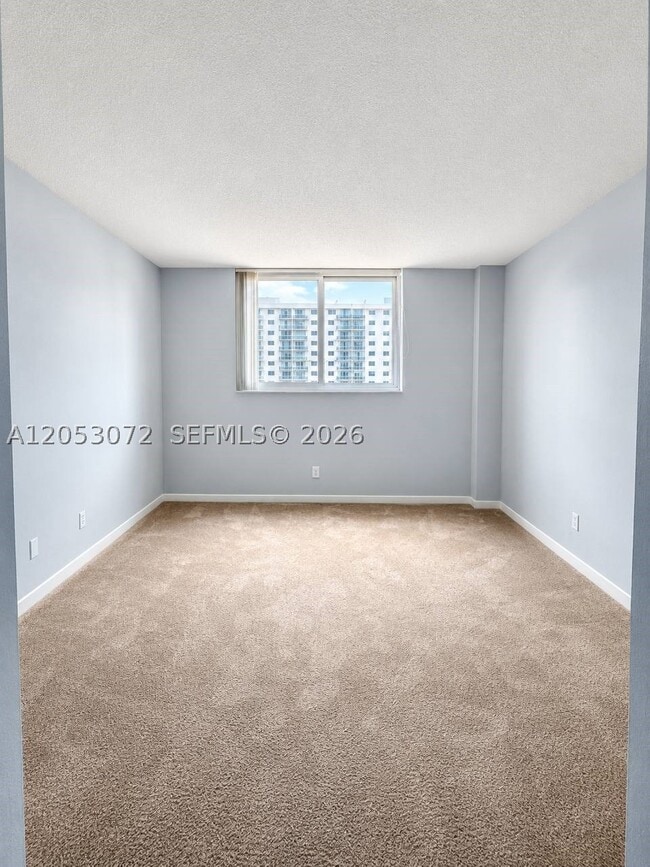 Building Photo - 19380 Collins Ave
