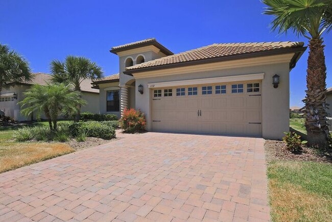 Building Photo - Premier 4/2 Home with a 2 Car Garage in Ch...