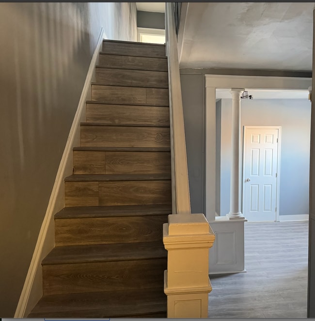 entry/ staircase to 2nd floor - 1240 N Curley St
