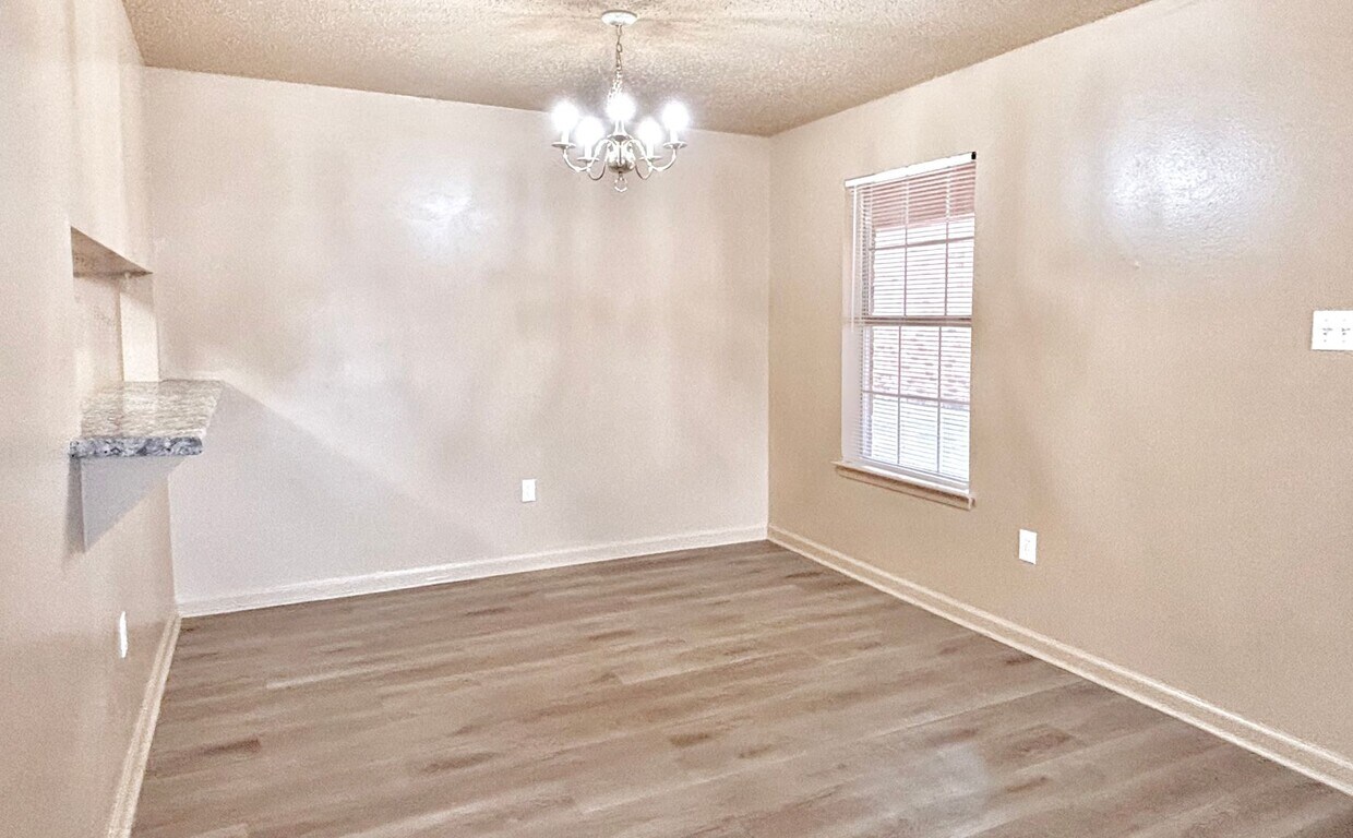 Primary Photo - Three Bedroom Apartment with Spacious Dini...